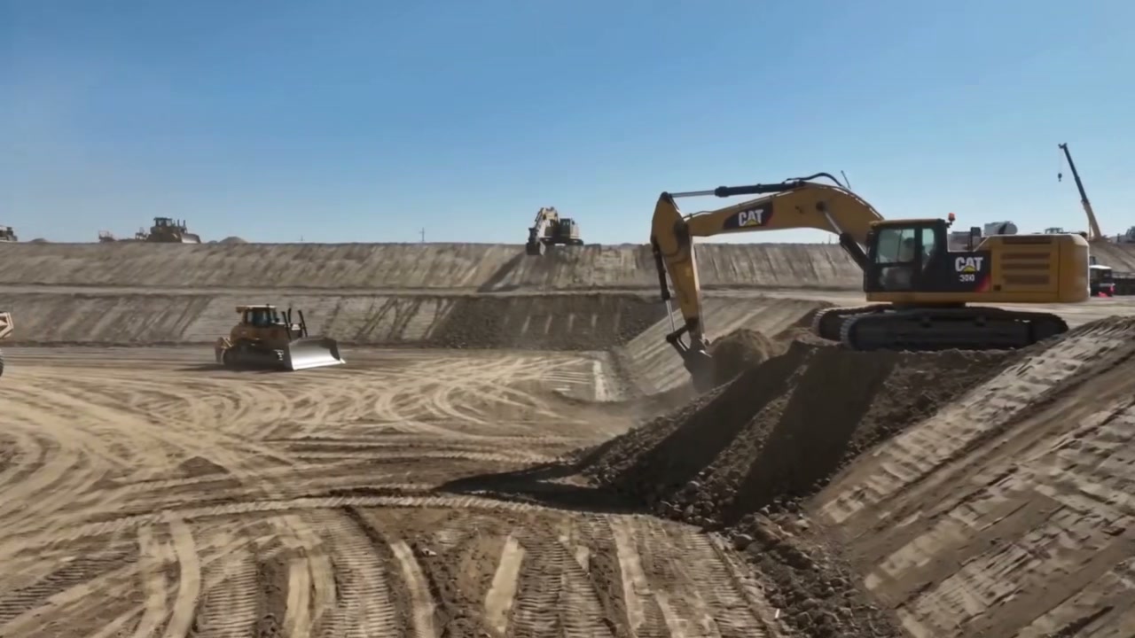 Heavy construction equipment on a commercial earthwork site
